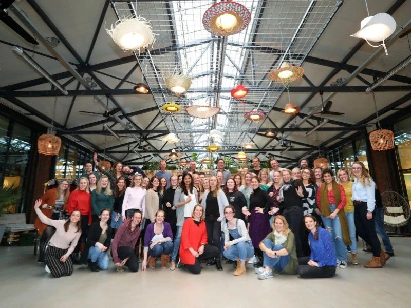 teamfoto riksja collega's kantoor
