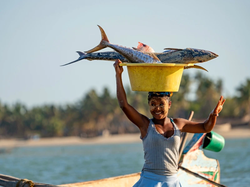 Madagascar - Local woman with fish