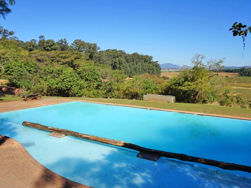 eSwatini bijenkorfhuisje zwembad in Zuid-Afrika