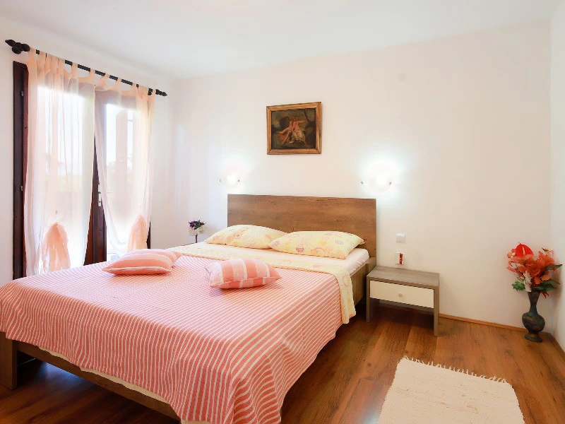 Slaapkamer in je appartement in Krk