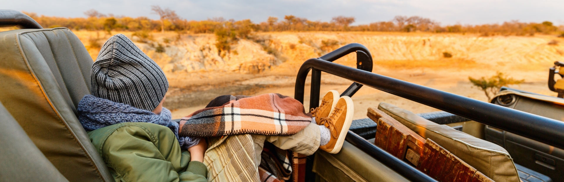 Kind in safari jeep Zuid-Afrika